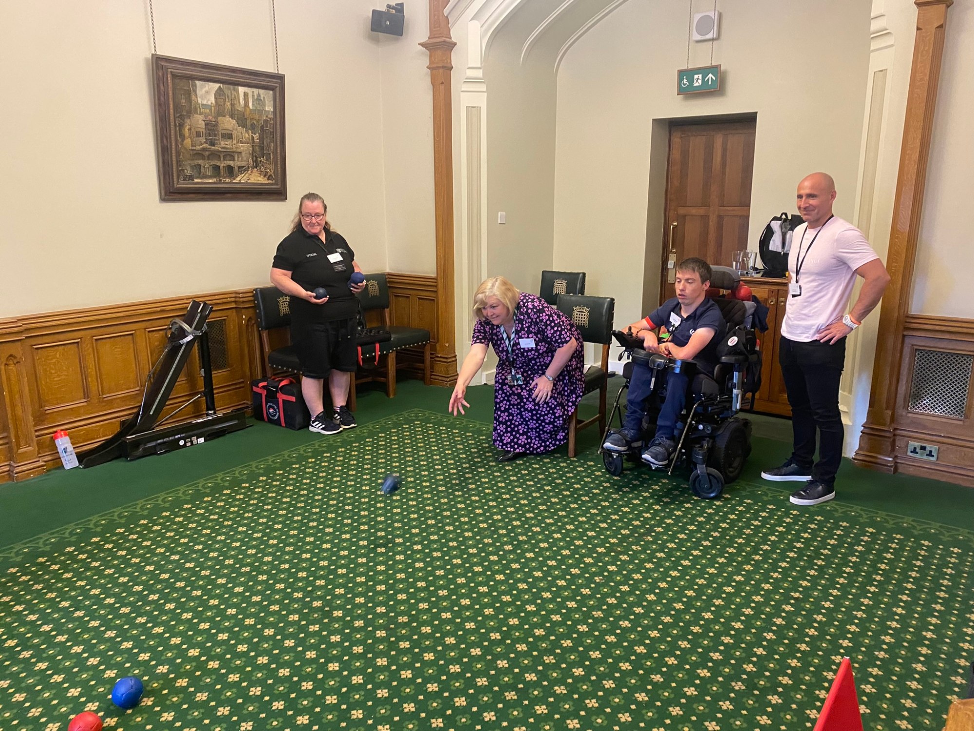 Jane Hunt MP playing a game of Boccia with Boccia Paralympic medalist David Smith